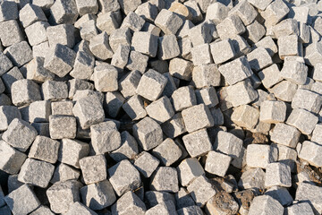 Background of grey square paving stones.