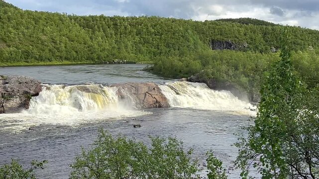 The Pikefossen waterfall in Norway on the Kautokeinoelva river