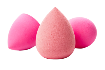 Three vibrant pink makeup sponges arranged to create an appealing composition for cosmetic application and beauty product promotion, perfect for tutorials and advertising campaigns.