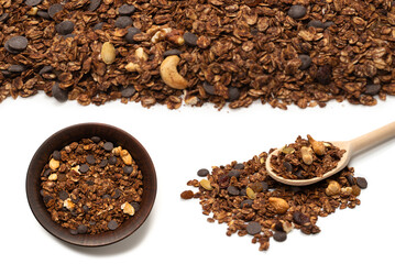 Chocolate granola cereal with nuts background.