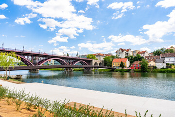 View of the Lent district along the Drava River, historic riverside promenade and cultural heart of Maribor, Slovenia, known for wine heritage, old town architecture and relaxed daily life.