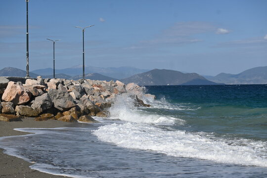 Powerful sea waves crashing against rocks on the coast of Evia island, Greece.