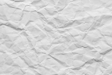 Close-up macro view of a wrinkled white paper surface,Macro white crumpled paper background,White crumpled paper texture background.