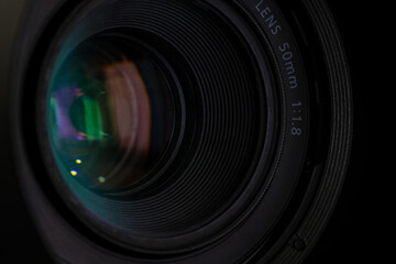 close-up macro camera lens,close up of a television lens  on a dark background,Camera lens,Macro of an iris,Camera - Photographic Equipment, Lens - Optical Instrument, Circle, Metal, Single Object.