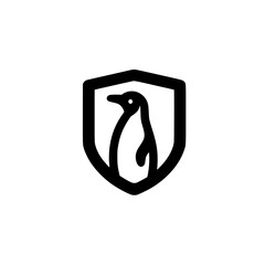 Obraz premium Penguin icon inside shield vector illustration representing protection safety resilience and secure defense