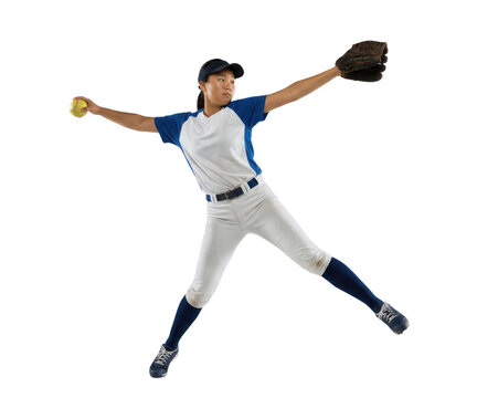 Female softball pitcher throwing ball isolated on white background