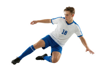 Male soccer player sliding tackle in blue and white uniform isolated