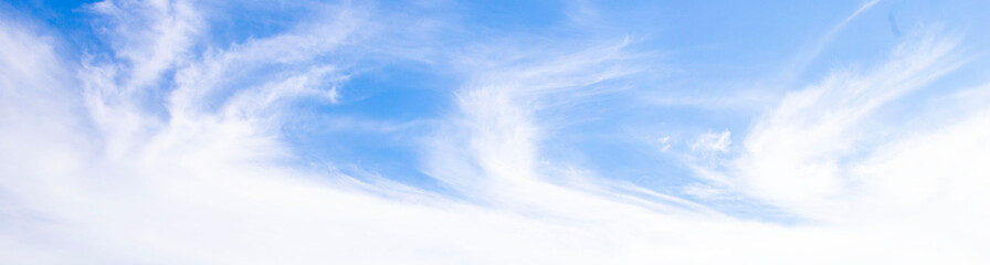 Sky blue background.Landscape white cloud with abstract texture,Panorama nature summer design. Spring blue sky, clouds with light sun for holiday banner.Winter beauty gradient blue sky for environment