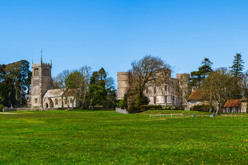Fototapeta premium Lulworth Castle Wareham and Lulworth Abbey in Lulworth, Dorset, England, UK; Wareham Castle; medieval estate at Lulworth castle on the Jurassic coast