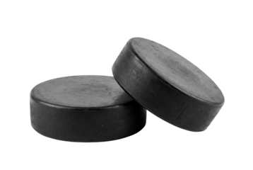 Two black ice hockey pucks isolated on white background