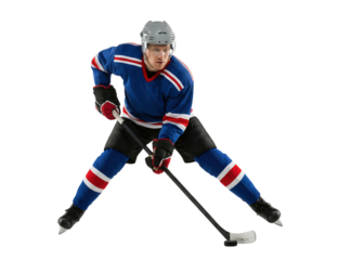 Ice hockey player in blue uniform skating with puck isolated on white