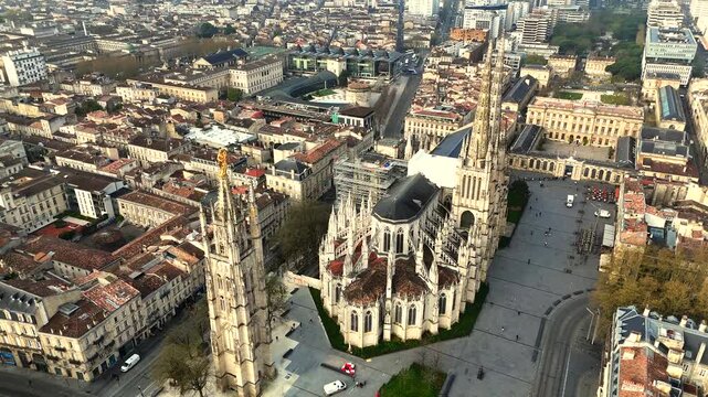 Drone panorama of Saint-Andre Cathedral and Pey Berland tower in Bordeaux during golden hour