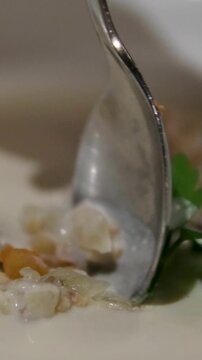 Clam chowder soup served table side from spouted container dramatic presentation fine dining modern cuisine
