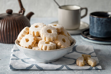 Cookies arranged in a bowl, ready to accompany tea time.