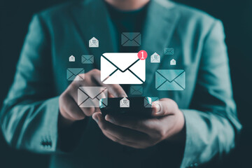 Email inbox management concept with professional using smartphone and multiple envelope icons. New message notification, email overload, digital communication, customer engagement business technology.