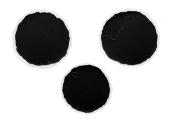 Three torn black circles isolated on transparent background