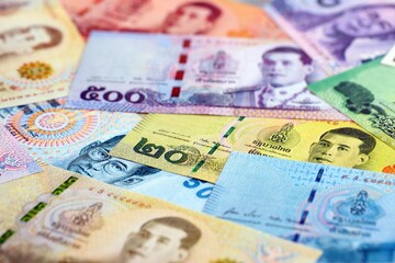Thai baht currency money bills. The current banknotes lies on table in big amount close up
