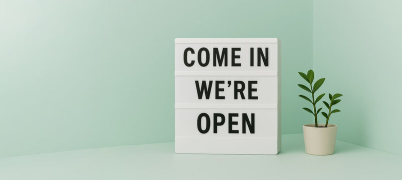 Come in were open lightbox message on mint green background