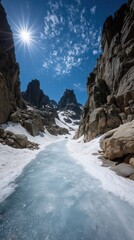 Mountain valley view with ice river and clear sky under sun during daytime in summer