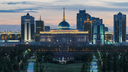 Obraz premium Close up view of Astana city day to night timelapse and the president's residence Akorda with park