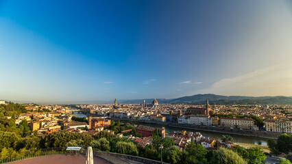 Fototapeta premium Top view of Florence city timelapse at sunrise with arno river bridges and historical buildings