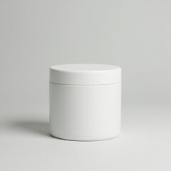 White cosmetic jar on a plain background.