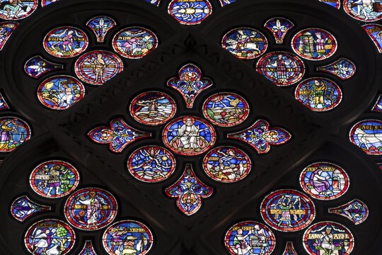 Colourful stained glass windows, Notre-Dame Cathedral, former episcopal church of the diocese of Lausanne, today the main reformed church of the city of Lausanne, canton of Vaud, Switzerland