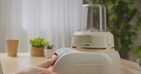 Close up of Modern White Kitchen Blender in Use