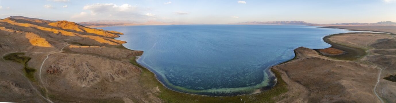Aerial view, Vast empty landscape at the mountain lake Song Kul, Moldo Too Mountains, Naryn region, Kyrgyzstan