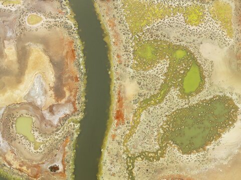 Marshland at the lagoon Estero del Rinc&oacute;n. Aerial view. Drone shot. Huelva province, Andalusia, Spain