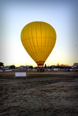 Landscape with the preparation and inflation of a hot air balloon
