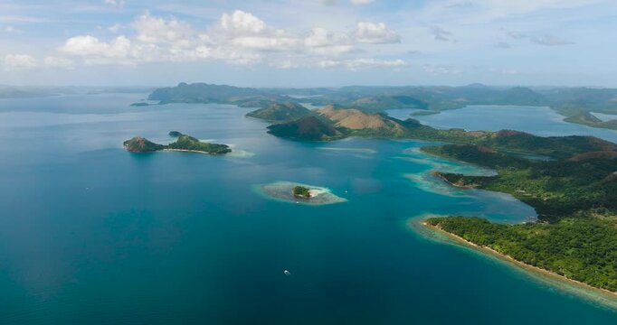 Aerial view of CYC Beach and Dimanglet Island with blue sea. Lajala, Coron. Palawan. Philippines.