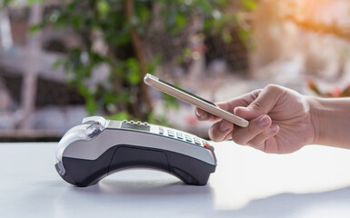 Contactless payment by smartphone. Payment with NFC technology