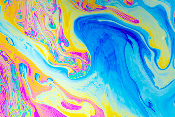 Psychedelic multicolored background abstract. Rainbow colors. patterns background. Photo macro shot of soap bubbles