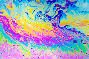 Psychedelic multicolored background abstract. Rainbow colors. patterns background. Photo macro shot of soap bubbles