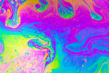Fototapeta premium Psychedelic multicolored background abstract. Rainbow colors. patterns background. Photo macro shot of soap bubbles
