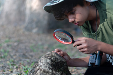 A curious mind exploring tiny details, discovering wonders through a magnifying glass.