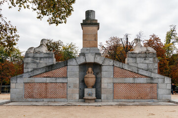 Retiro Park Sphinx fountain monument in Madrid during autumn