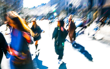 Postmodernism style, artistic motion of people with shopping bags crossing Oxford Circus junction at sunny day. London