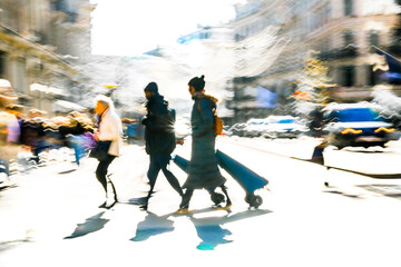 Postmodernism style, artistic motion of people with shopping bags crossing Oxford Circus junction at sunny day. London