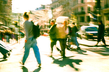 Postmodernism style, artistic motion of people with shopping bags crossing Oxford Circus junction at sunny day. London
