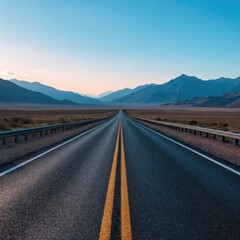 Open Highway Leading to Distant Mountains at Dusk