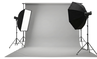 Professional photography studio setup with lighting equipment and a seamless backdrop isolated on