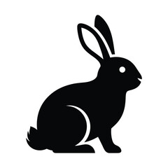 Obraz premium Black silhouette of a rabbit sitting on a white background bunny