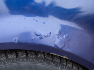 Car with peeling paint. Corrosion of metal under the paint. How to maintain a car body to prevent rust