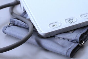 Blood pressure measuring device isolated on table no people stock photo stock image