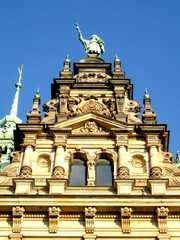 Fototapeta premium One of the decorative gables of the Hamburg Rathaus, decorated with statues, carvings and pillars