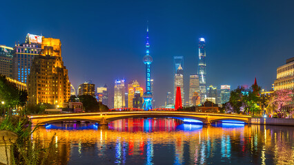 Shanghai city and Huangpu river at night, China.
