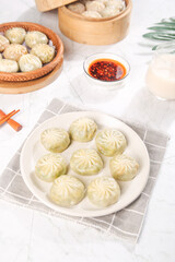 Fresh Steamed Shengjian Dumplings with Dipping Sauce - Dim Sum Breakfast