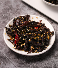 Spicy Deep-Fried Beef Jerky with Sesame Seeds and Chili Sauce